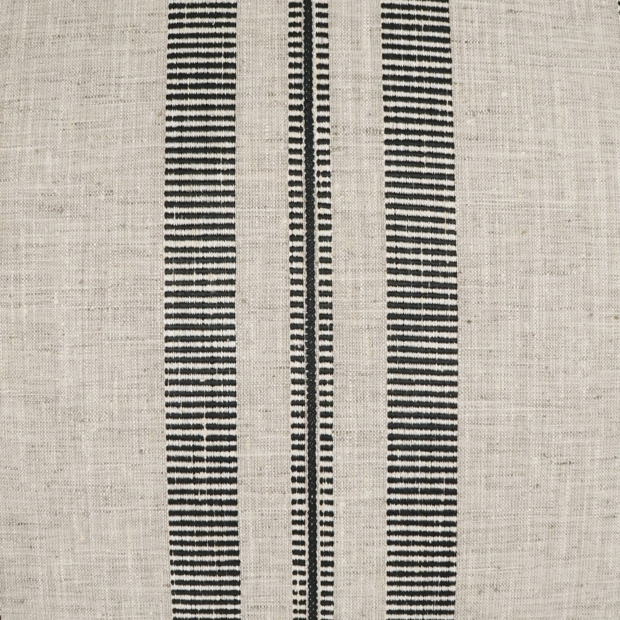 Beige linen fabric with three narrow vertical black stripe patterns; minimalist textile for home decor.
