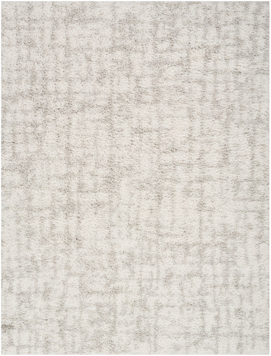 Cream plush area rug with subtle textured pile and light beige mottling.