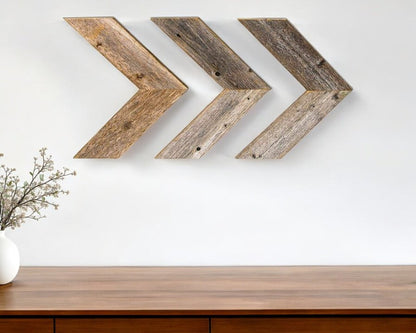 Set of Three Gray Distressed Wood Hanging Arrow Dimensional Sculptures