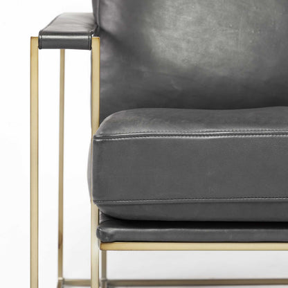 34" Black and Gold Faux Leather Lounge Chair