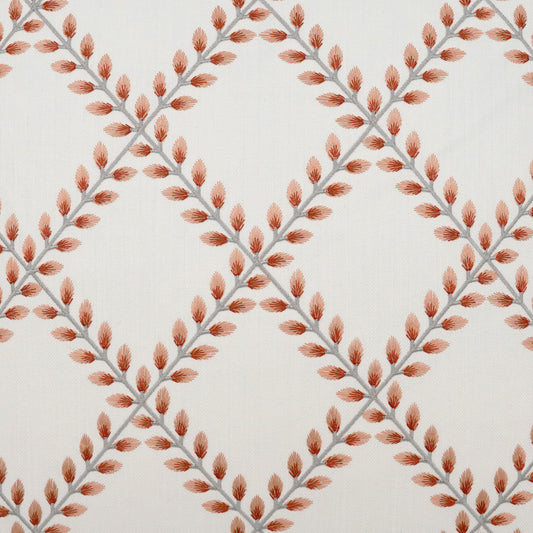 Ivory fabric with rust-orange leaf clusters on gray stems forming a diamond lattice pattern.