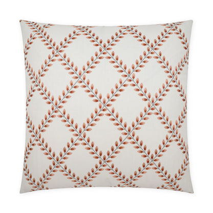 Square decorative throw pillow with coral background and orange leaf-patterned diamond lattice design.