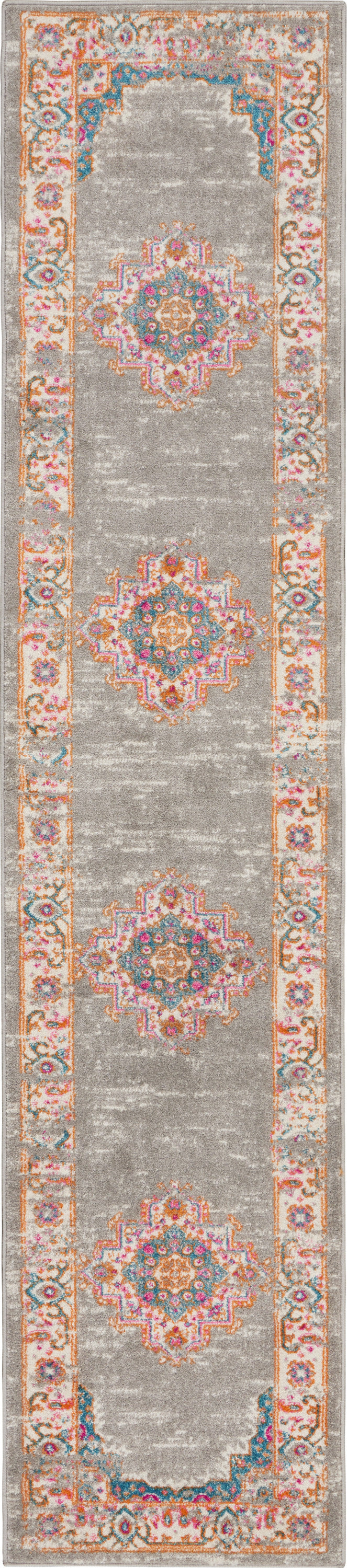 Grey distressed oriental runner rug with repeating pink, teal and orange medallions and floral border.