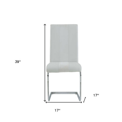 Set of Four White and Silver Upholstered Faux Leather Dining Side Chairs