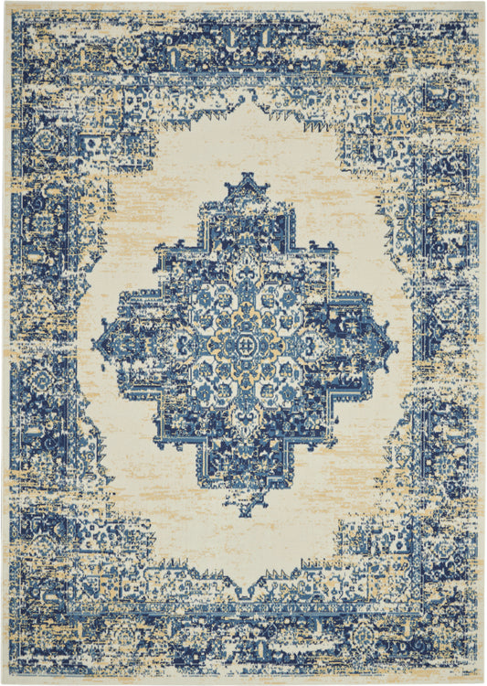 Rectangular blue and cream distressed oriental rug with a central geometric floral medallion and ornate border.
