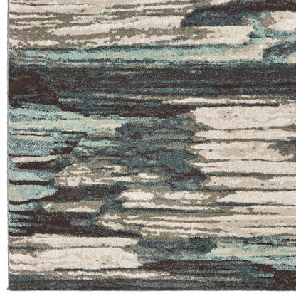 6' X 9' Ivory Blue And Gray Abstract Area Rug