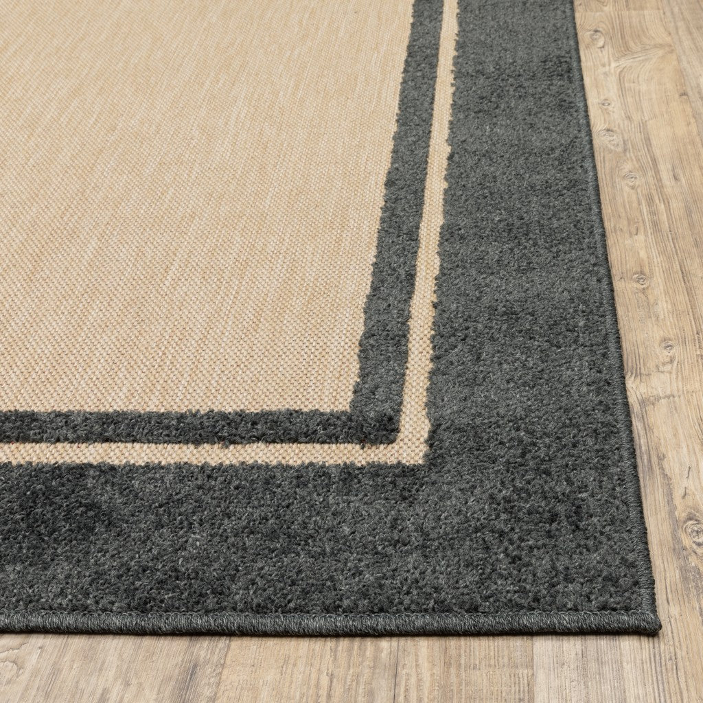 2' X 8' Beige and Black Indoor Outdoor Area Rug