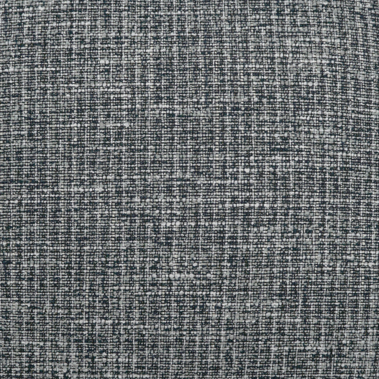 Black textured pillow fabric with a speckled, tweed-like weave.