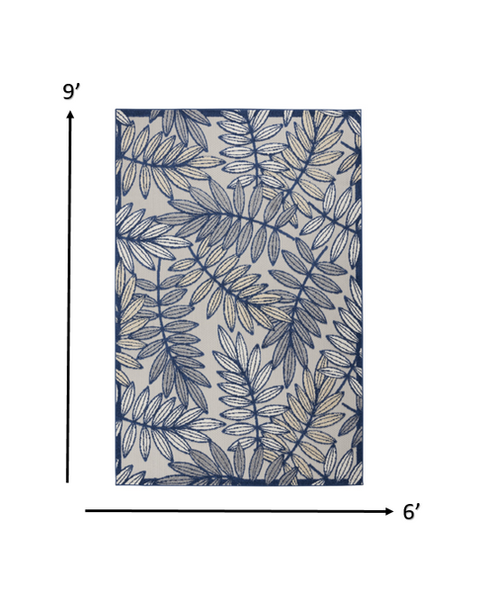 7' X 10' Ivory And Blue Floral Indoor Outdoor Area Rug