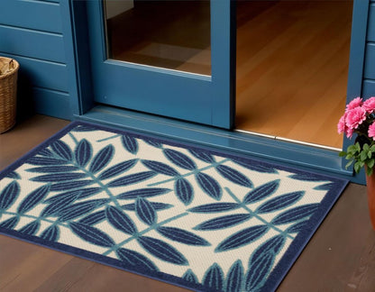 6' X 9' Blue And Ivory Floral Indoor Outdoor Area Rug