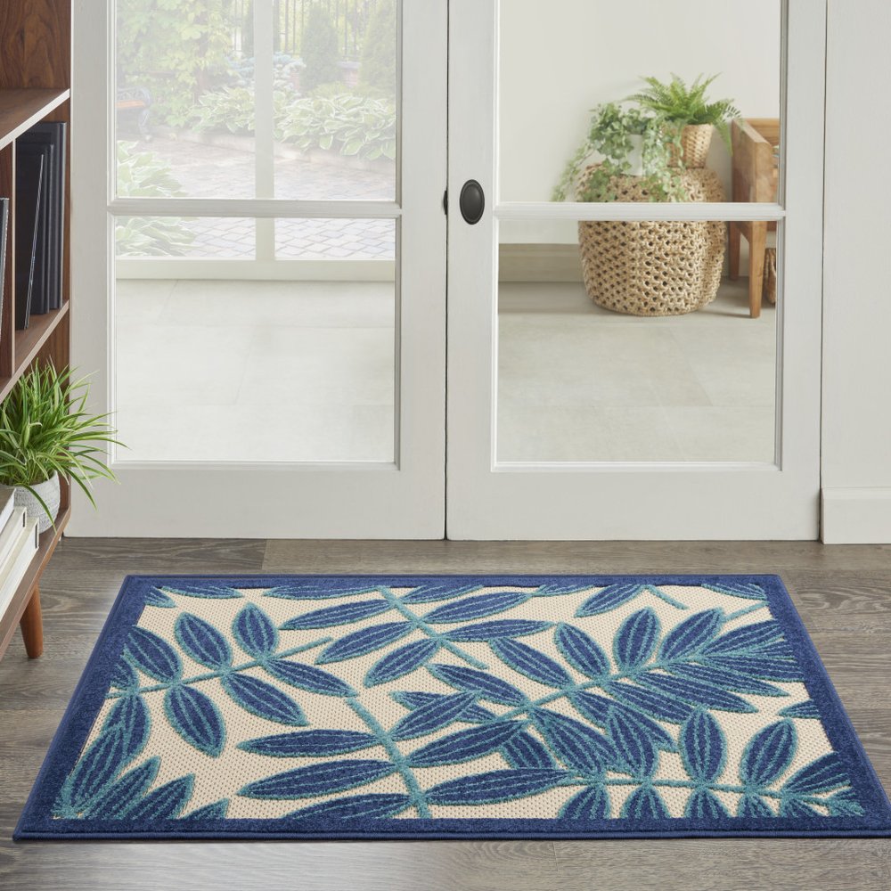 7' X 10' Blue And Ivory Floral Indoor Outdoor Area Rug