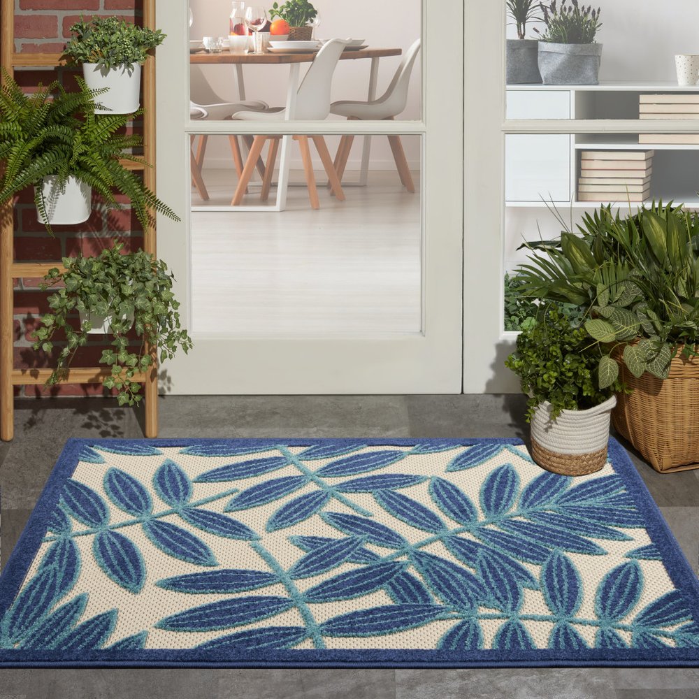 7' X 10' Blue And Ivory Floral Indoor Outdoor Area Rug