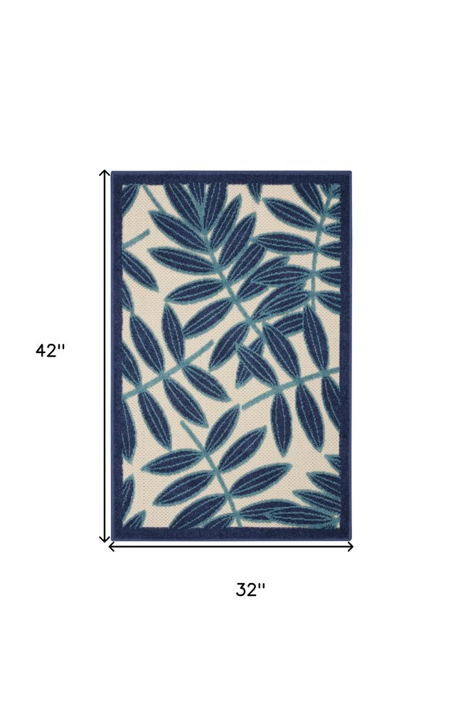 7' X 10' Blue And Ivory Floral Indoor Outdoor Area Rug