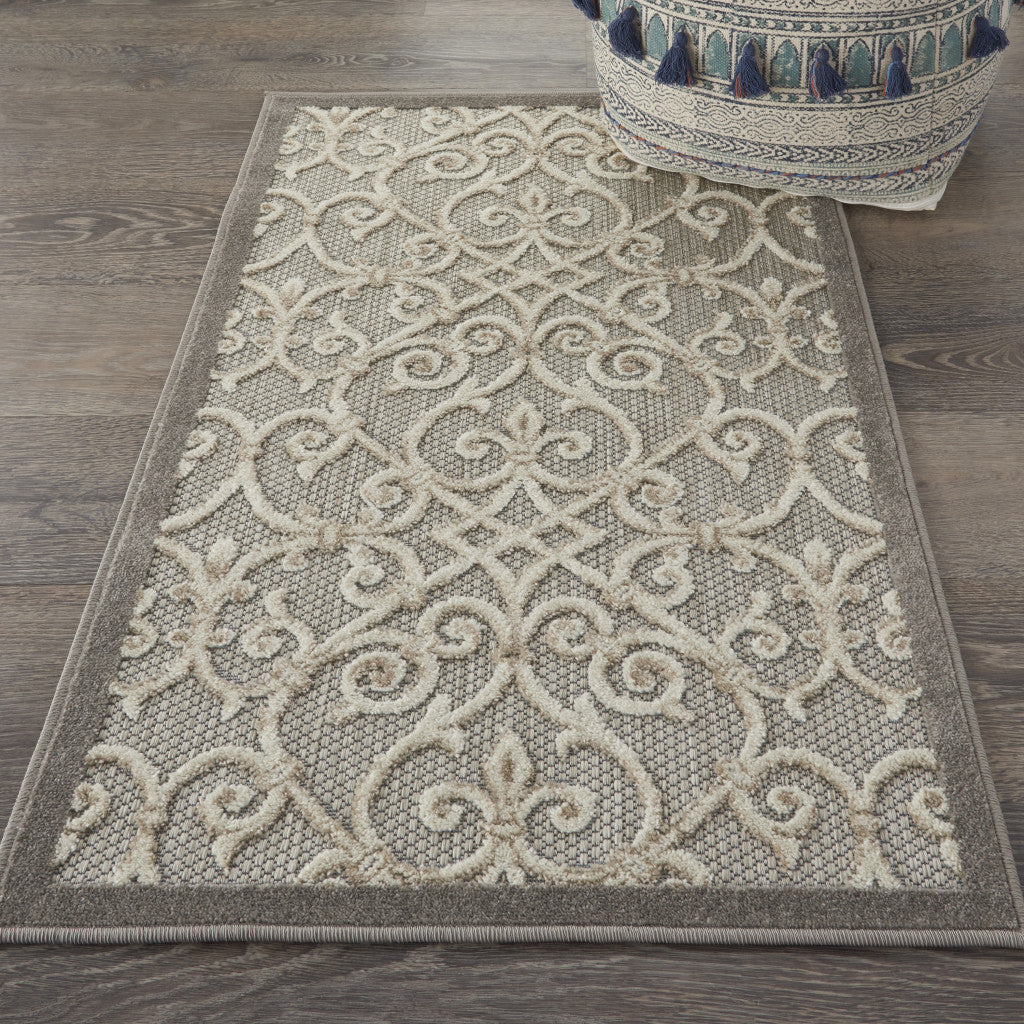 5' X 8' Gray And Ivory Floral Indoor Outdoor Area Rug