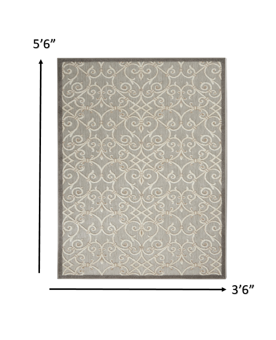 5' X 8' Gray And Ivory Floral Indoor Outdoor Area Rug