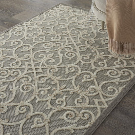 8' X 11' Gray And Ivory Floral Indoor Outdoor Area Rug