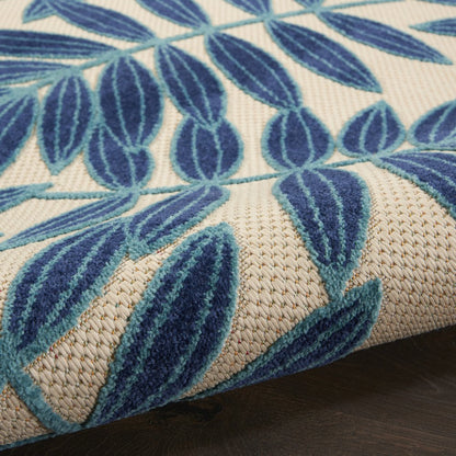 7' X 10' Blue And Ivory Floral Indoor Outdoor Area Rug