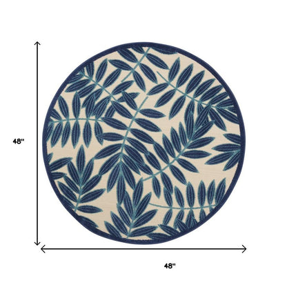 7' X 10' Blue And Ivory Floral Indoor Outdoor Area Rug