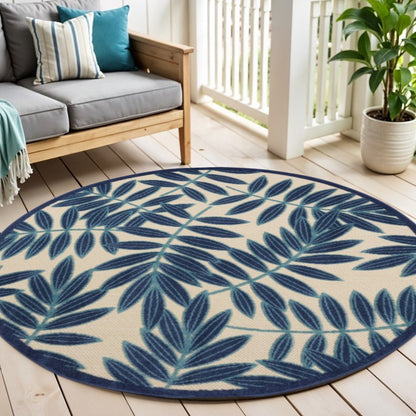 7' X 10' Blue And Ivory Floral Indoor Outdoor Area Rug