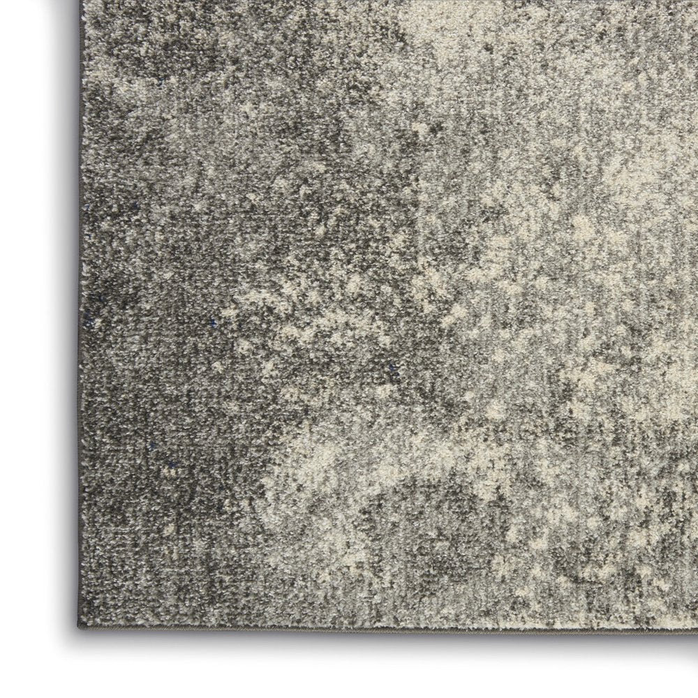 5' X 7' Gray And Ivory Abstract Area Rug