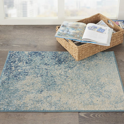 4' X 6' Blue And Ivory Abstract Area Rug
