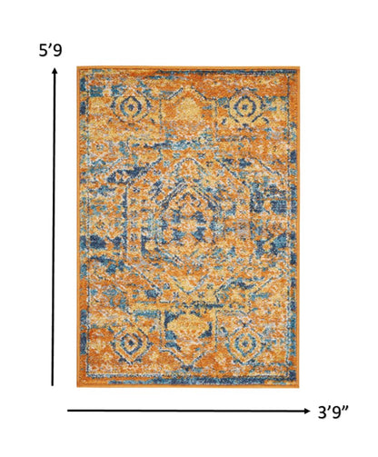 4' X 6' Teal And Gold Medallion Distressed Area Rug