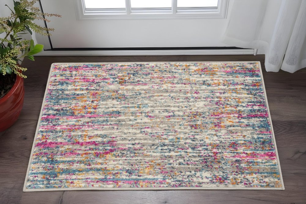 7' X 10' Ivory And Blue Abstract Area Rug