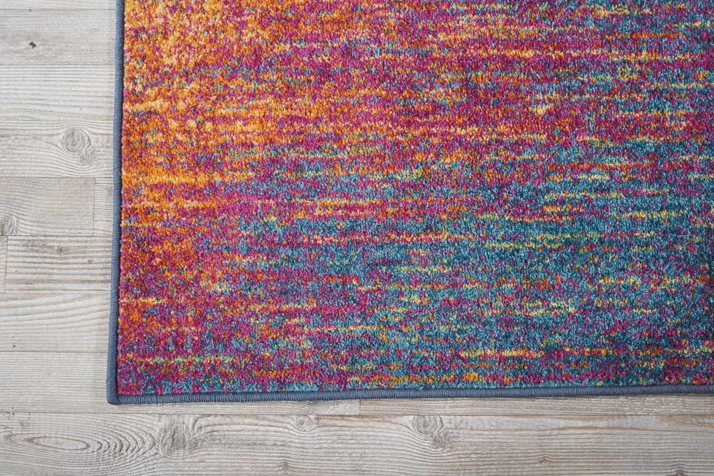5' X 7' Blue And Pink Abstract Power Loom Area Rug