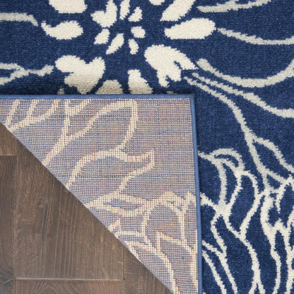 5' X 7' Blue And Ivory Floral Area Rug