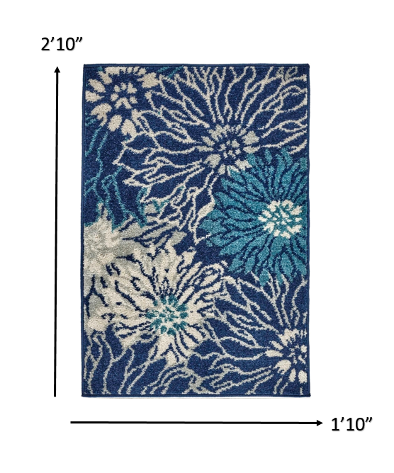 7' X 10' Blue And Ivory Floral Power Loom Area Rug