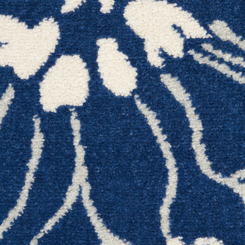7' X 10' Blue And Ivory Floral Area Rug