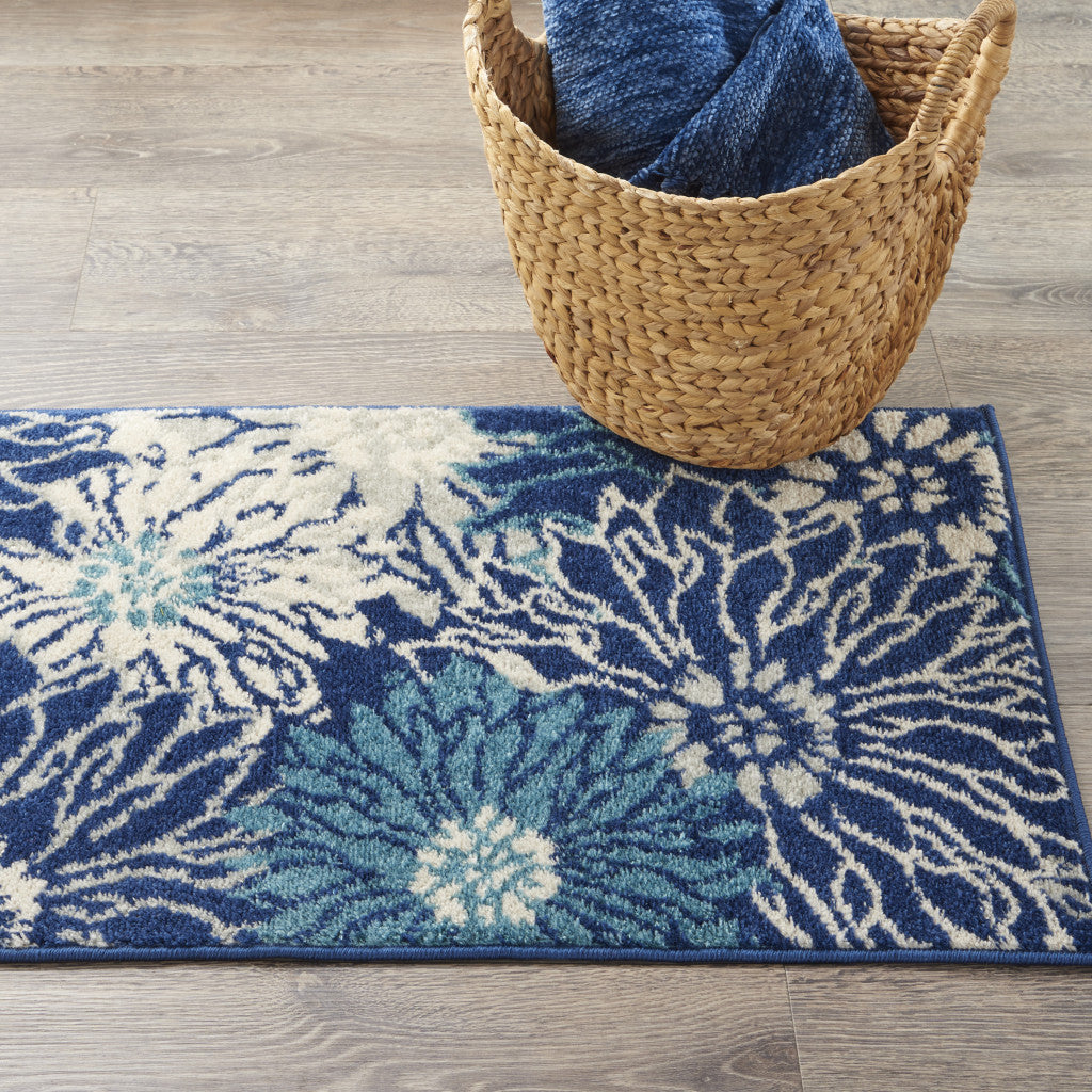 7' X 10' Blue And Ivory Floral Power Loom Area Rug