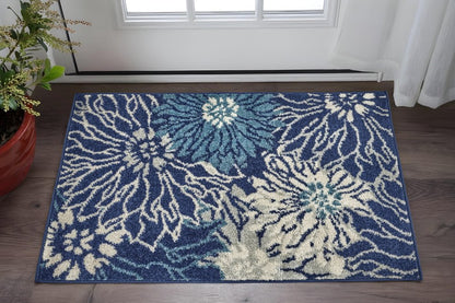 5' X 7' Blue And Ivory Floral Area Rug