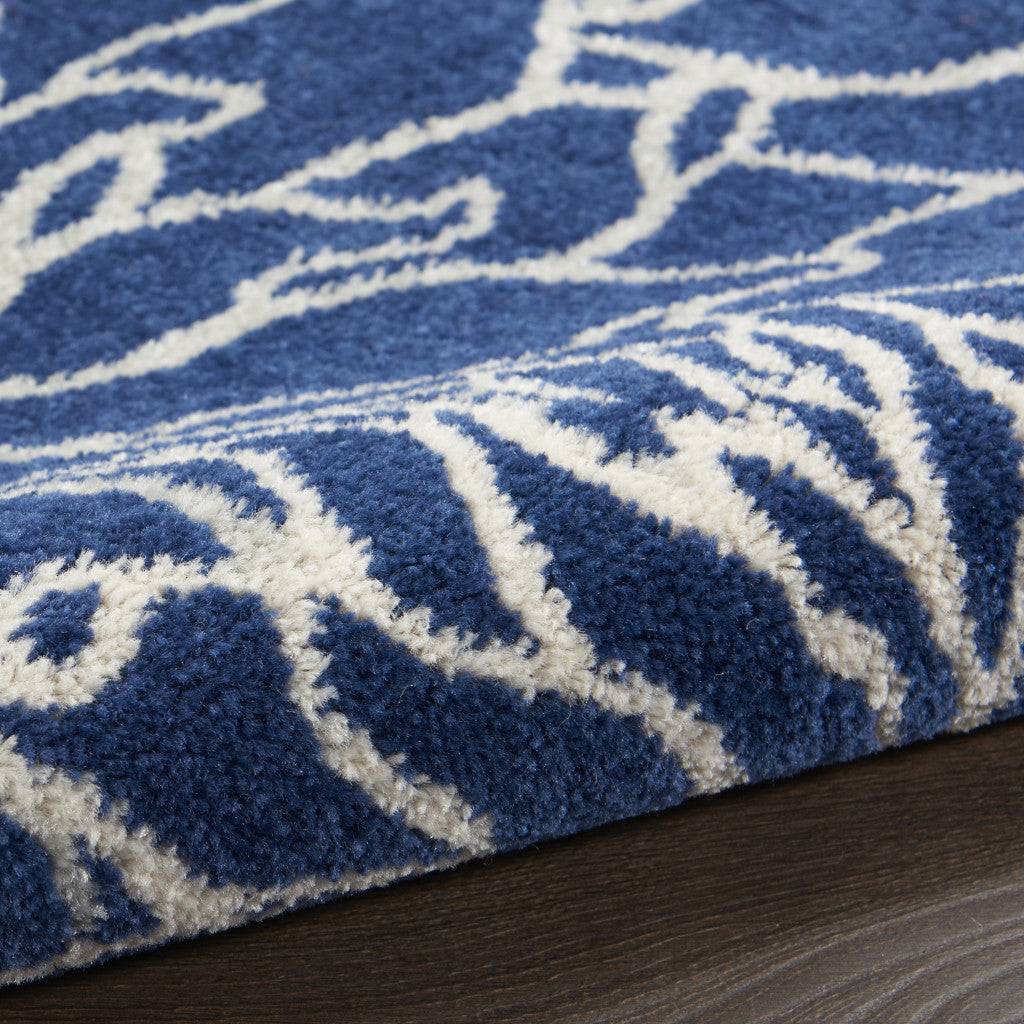 7' X 10' Blue And Ivory Floral Power Loom Area Rug