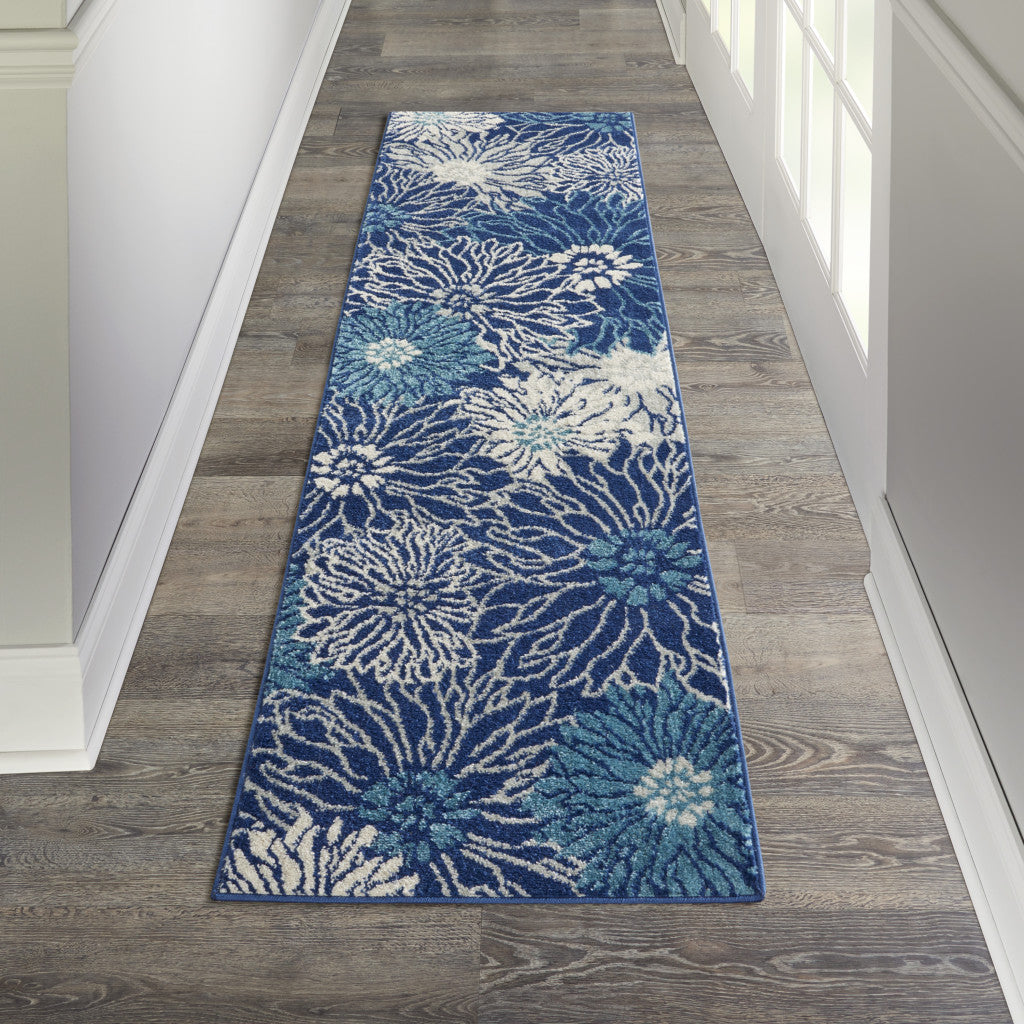 7' X 10' Blue And Ivory Floral Power Loom Area Rug