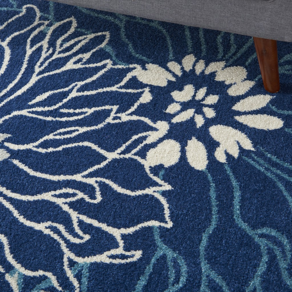 8' Blue And Ivory Round Floral Dhurrie Area Rug