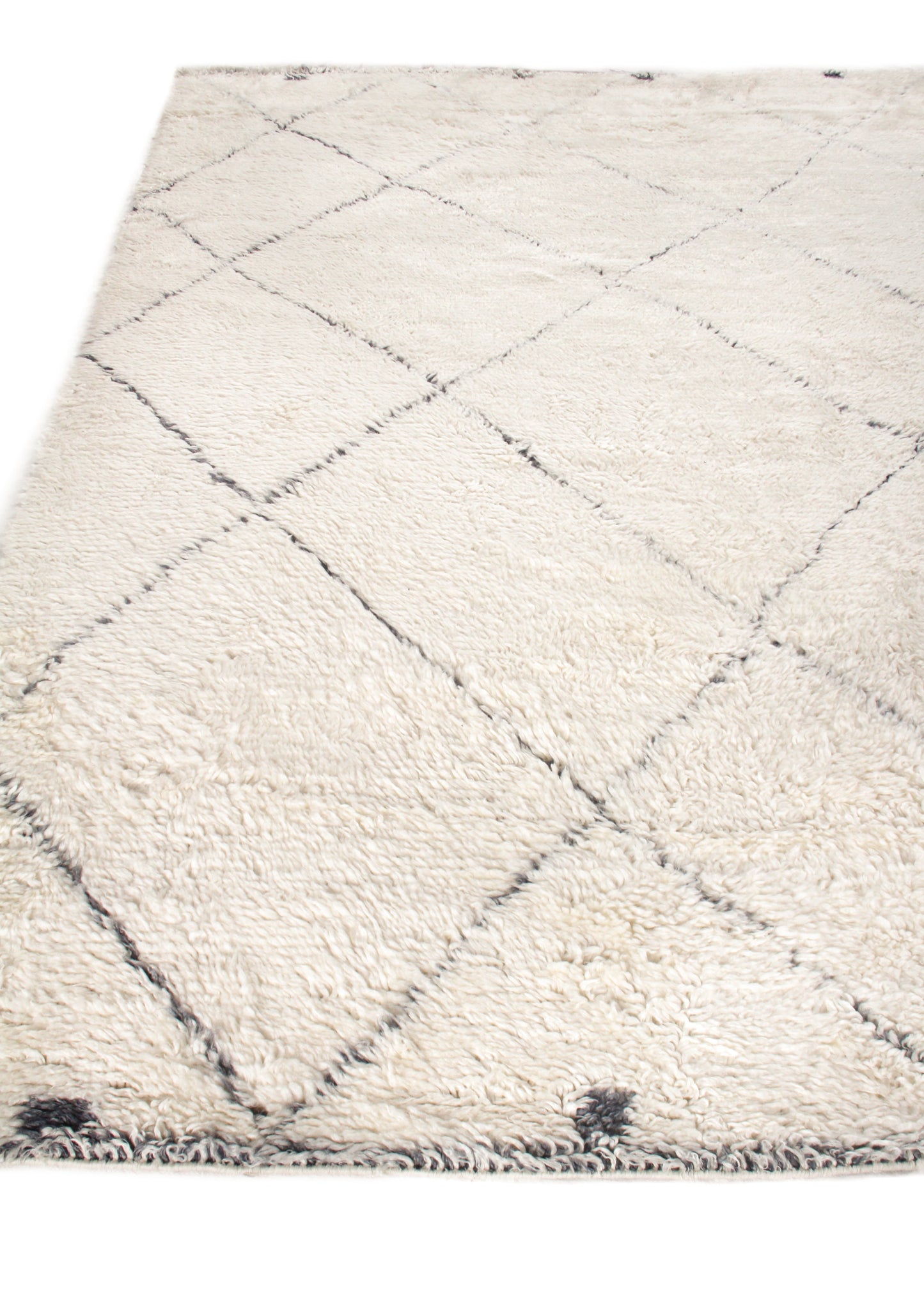 Moroccan indoor hand-knotted rug, cream with a dark gray diamond lattice pattern, rectangular with fringed edges.