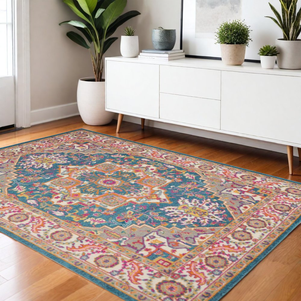 7' X 10' Teal And Ivory Medallion Distressed Area Rug