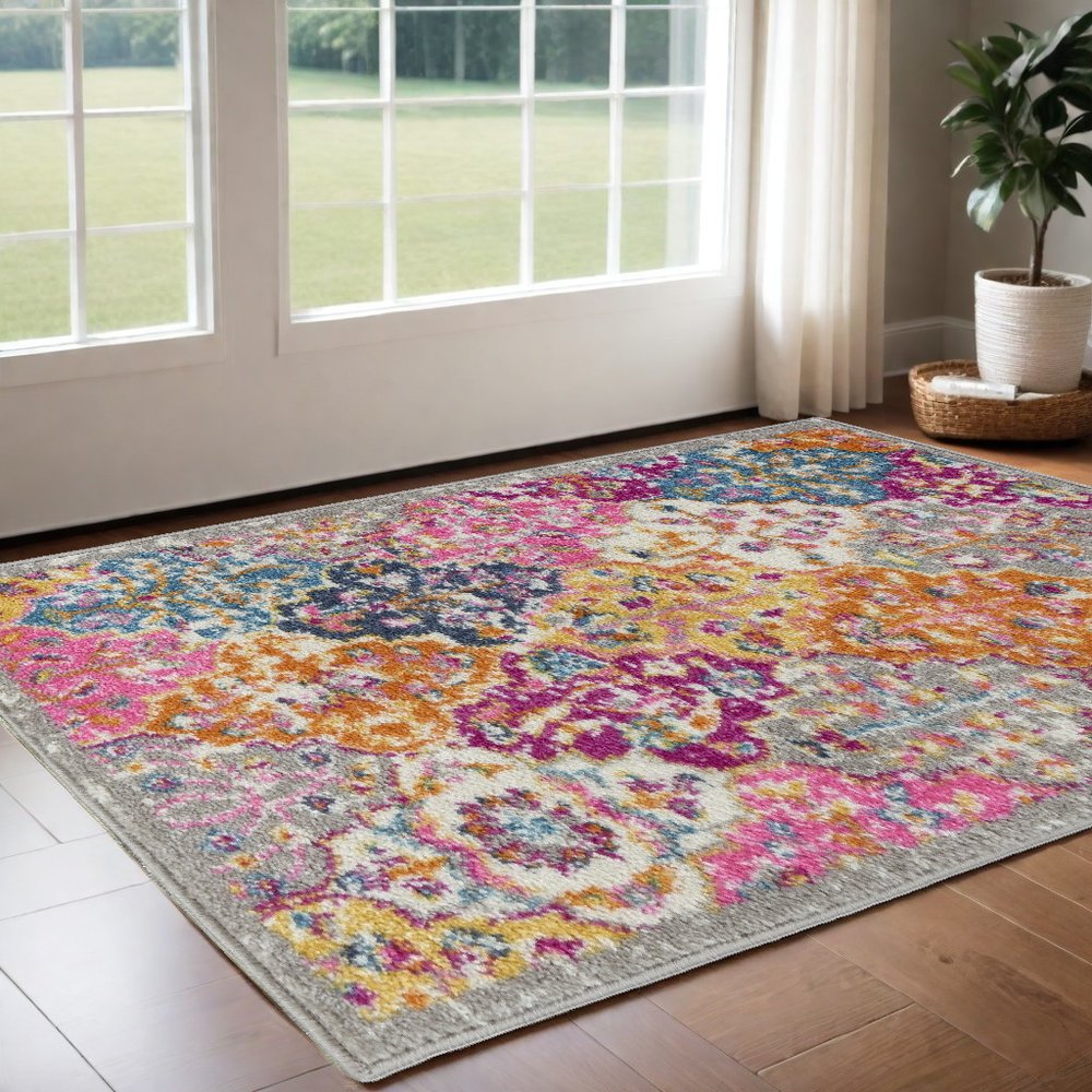 7' X 10' Gray Blue And Orange Quatrefoil Distressed Area Rug