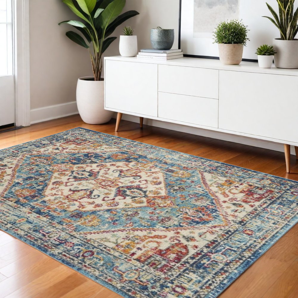 5' X 7' Ivory And Blue Oriental Distressed Area Rug