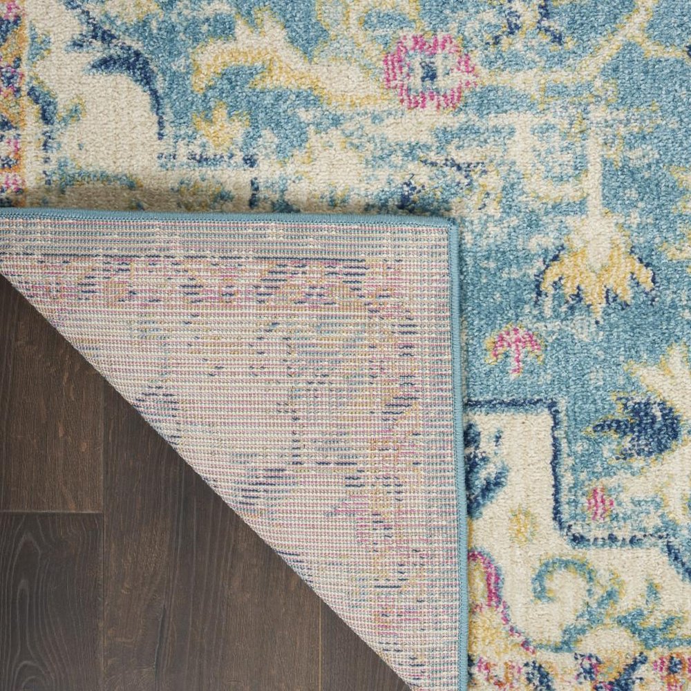 7' X 10' Ivory And Turquoise Oriental Distressed Area Rug