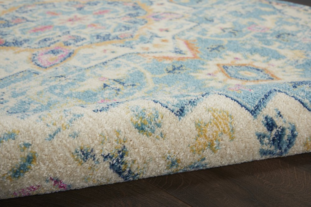 7' X 10' Ivory And Turquoise Oriental Distressed Area Rug