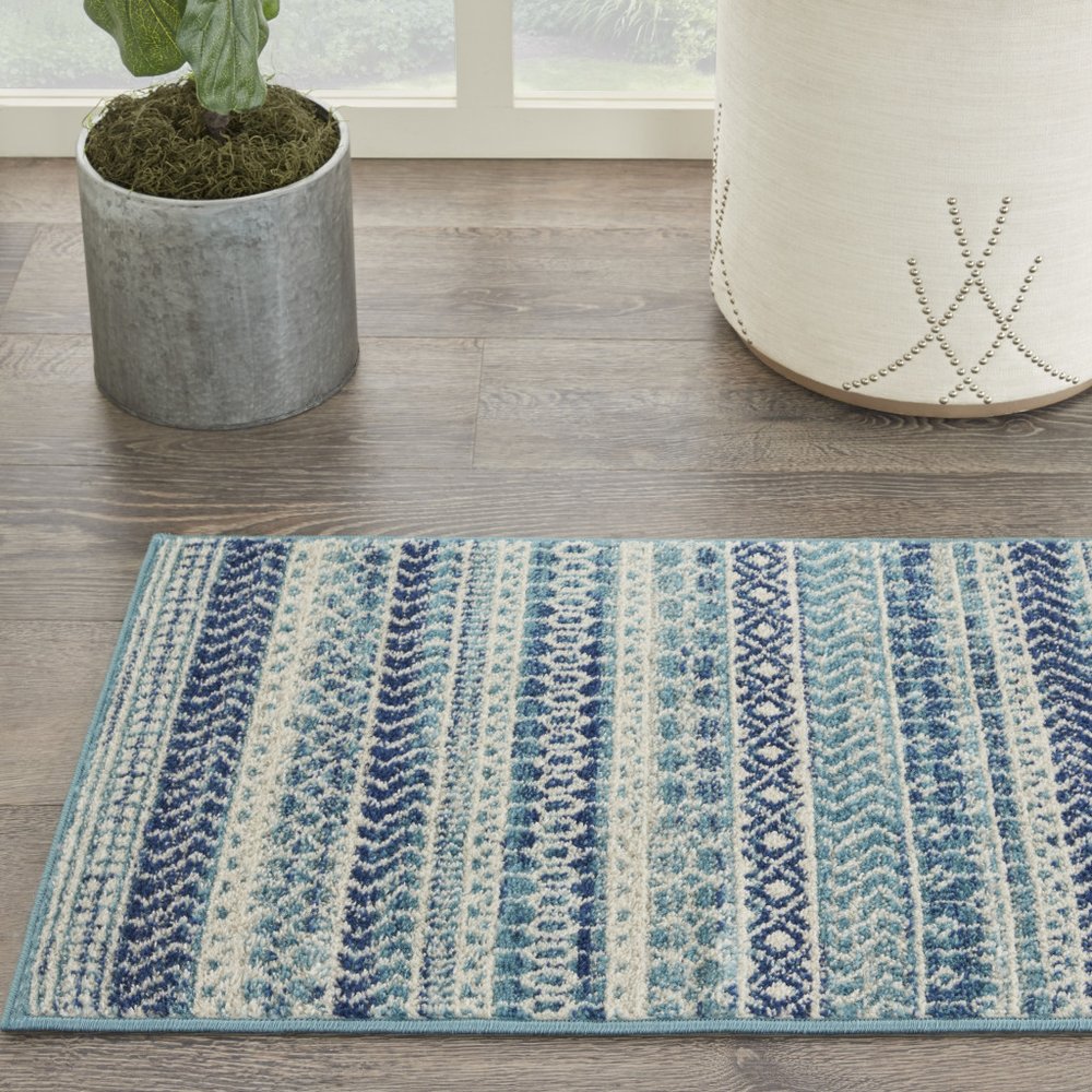 5' X 7' Navy Blue And Ivory Southwestern Area Rug