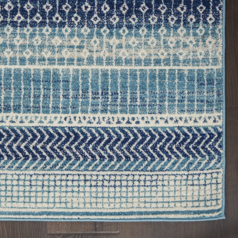 5' X 7' Navy Blue And Ivory Southwestern Area Rug