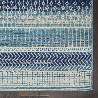 5' X 7' Navy Blue And Ivory Southwestern Area Rug