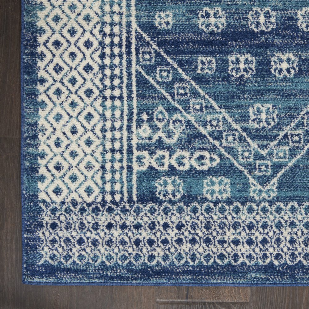 5' X 7' Navy Blue And Ivory Tribal Area Rug