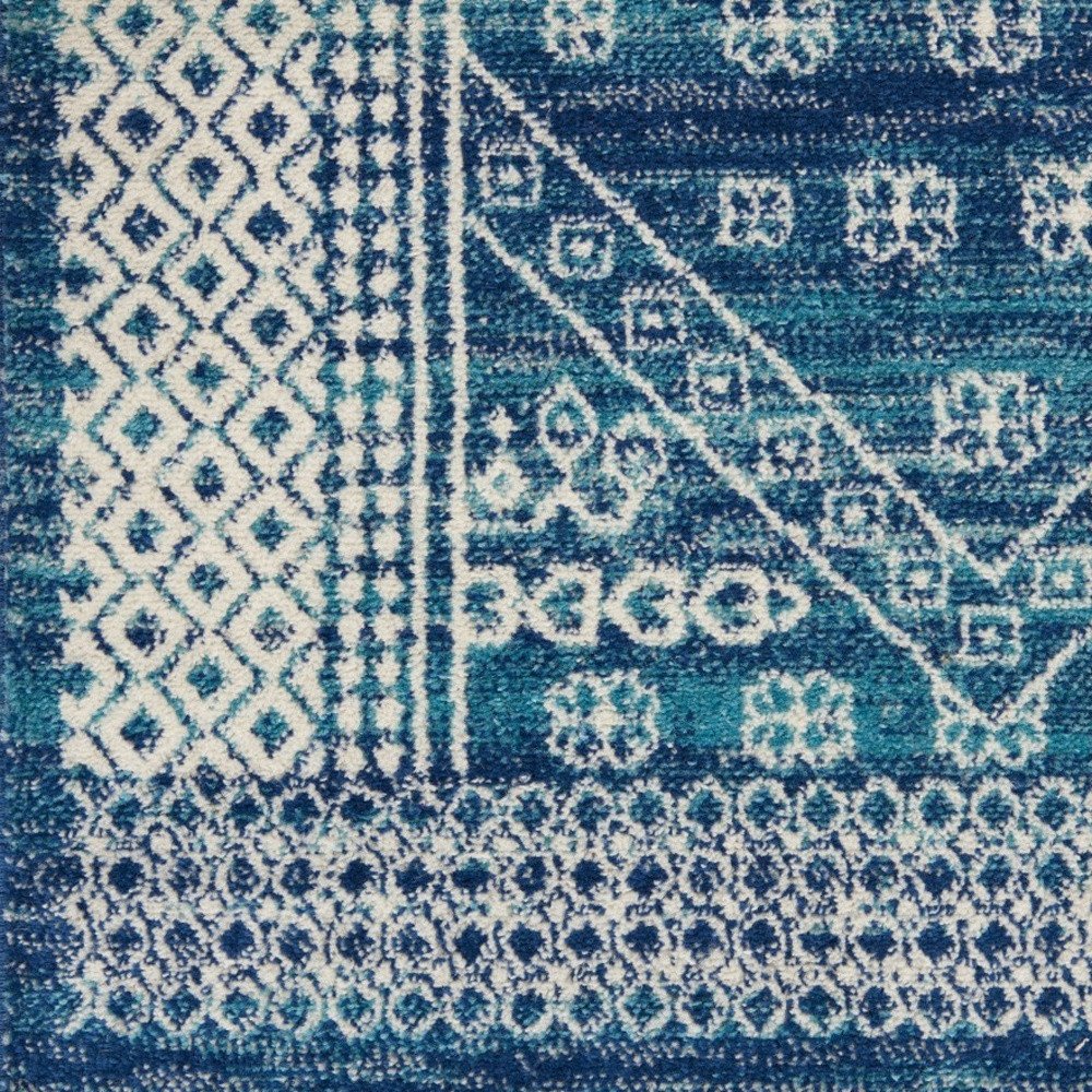 5' X 7' Navy Blue And Ivory Tribal Area Rug