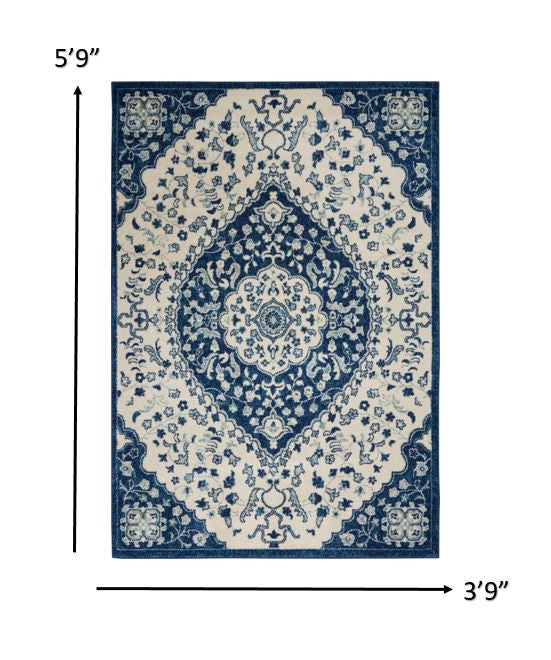 4' X 6' Blue And Ivory Power Loom Area Rug