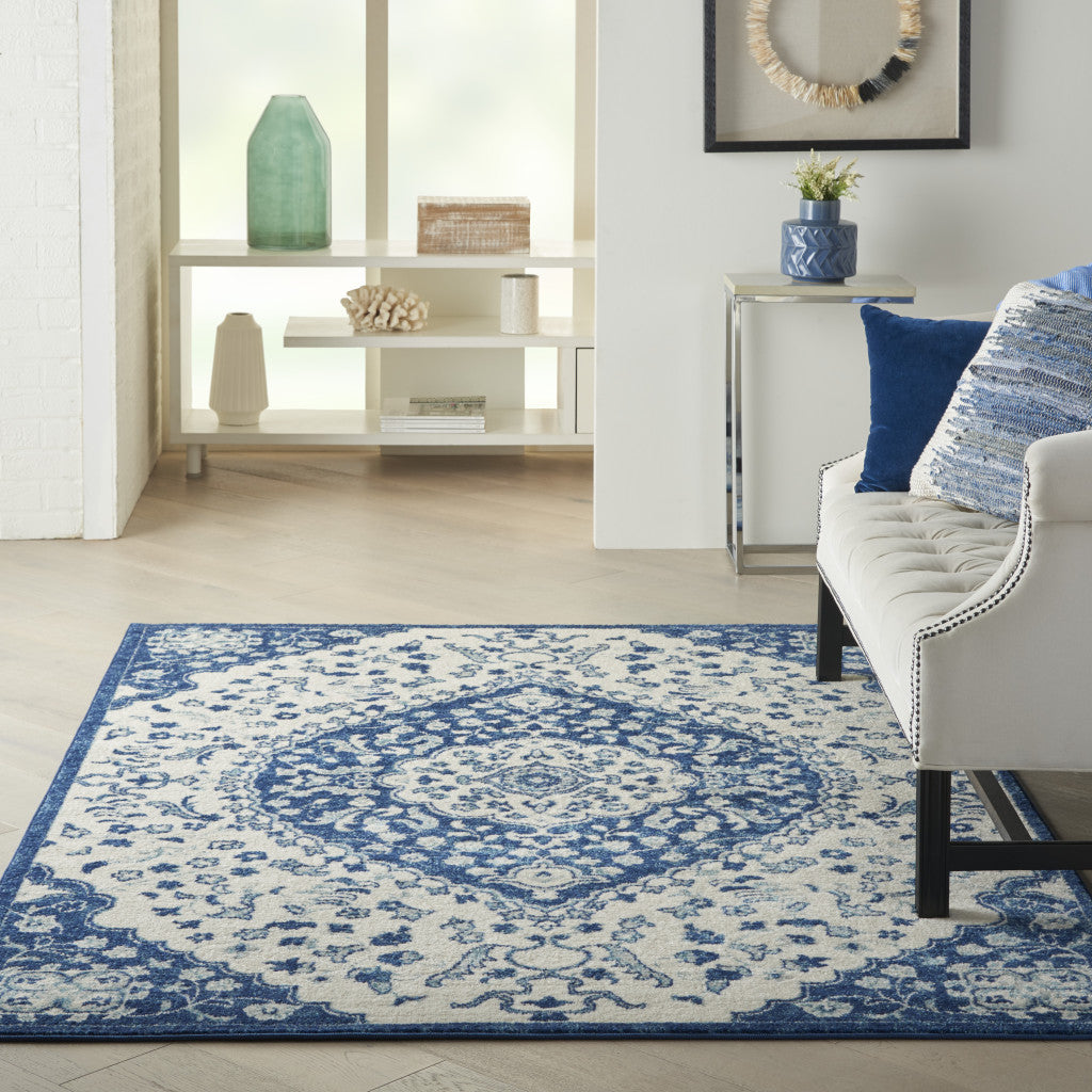 8' X 10' Blue And Ivory Power Loom Area Rug