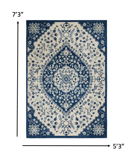 8' X 10' Blue And Ivory Power Loom Area Rug